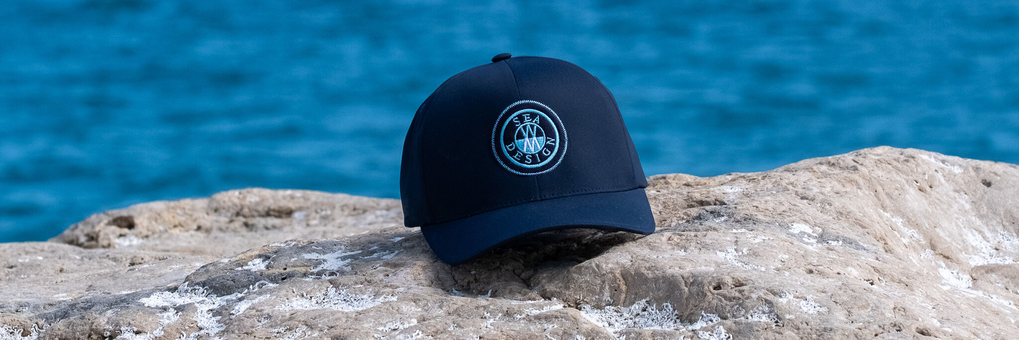 Crew wearing Sea Design caps and hats